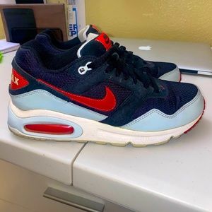 Women’s Nike Air Max Navigate. Black with Red and grey trim. Stylish Athletic